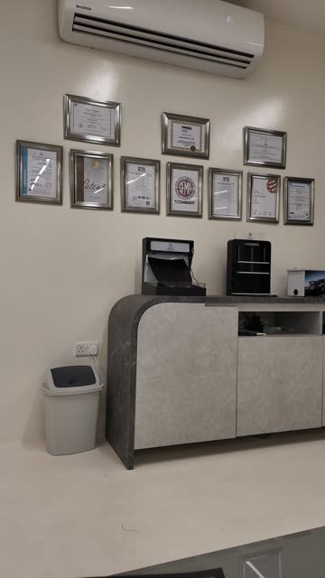 The Smart Shield reception desk and wall of manufacturer certificates